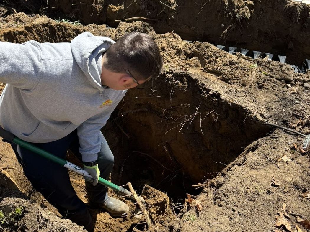 Old septic system being replaced with modern installation
