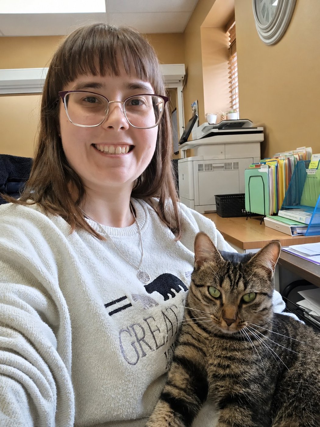Lindsey at the Mastin Septic office with Petunia the cat